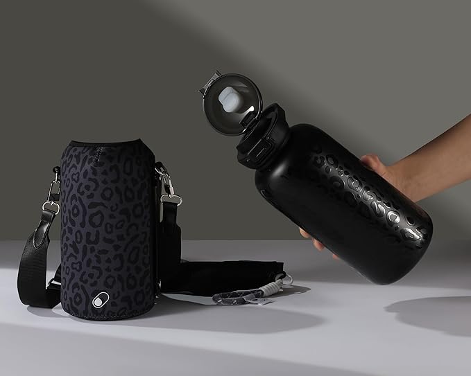 H2O Capsule Half Gallon Insulated Water Bottle With Straw - Stainless Steel Thermos Water Bottle With Sipping/Chugging Lid & Shoulder Strap For Storage - 64 oz Vacuum Flask, Hot Cold (Black Leopard)