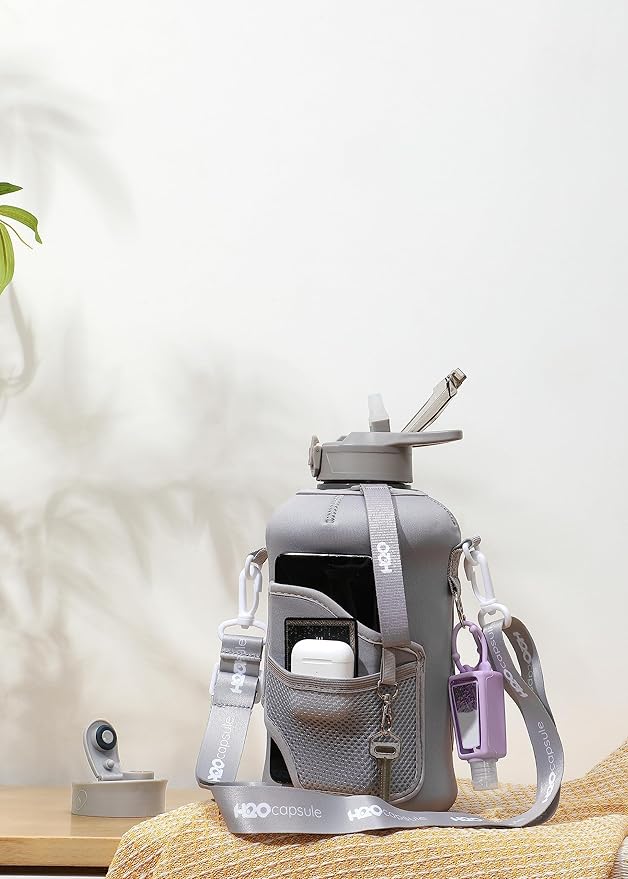 H2O Capsule 2.2L Half Gallon Water Bottle with Storage Sleeve and Removable Straw – BPA Free Large Reusable Drink Container with Handle - Big Sports Jug, 2.2 Liter (74 Ounce), Ashville