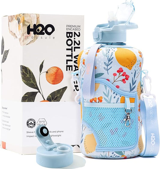 H2O Capsule 2.2L Half Gallon Water Bottle with Storage Sleeve and Removable Straw – BPA Free Large Reusable Drink Container with Handle - Big Sports Jug, 2.2 Liter (74 Ounce), Lemon Drop