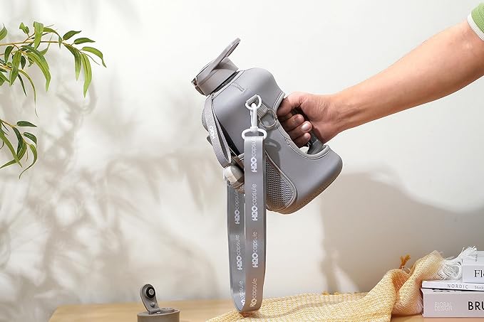 H2O Capsule 2.2L Half Gallon Water Bottle with Storage Sleeve and Removable Straw – BPA Free Large Reusable Drink Container with Handle - Big Sports Jug, 2.2 Liter (74 Ounce), Ashville