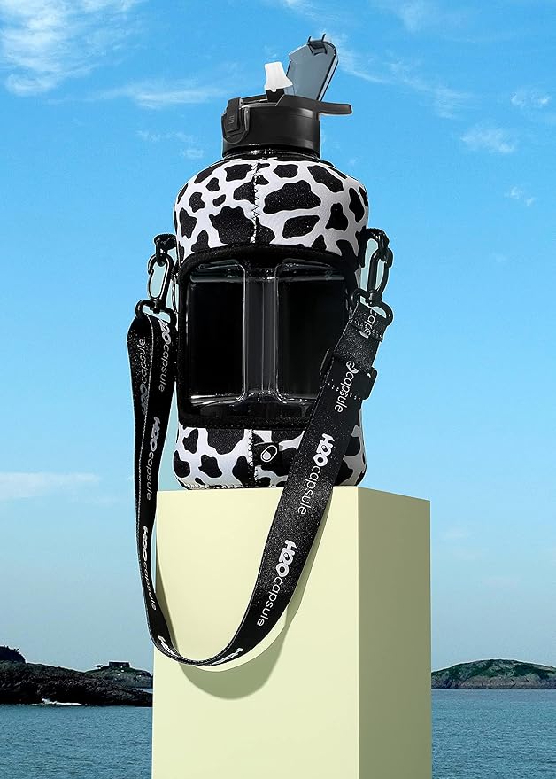 H2O Capsule 2.2L Half Gallon Water Bottle with Storage Sleeve and Removable Straw – BPA Free Large Reusable Drink Container with Handle - Big Sports Jug, 2.2 Liter (74 Ounce), Cowbell