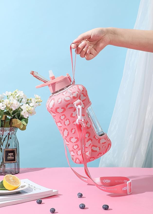 H2O Capsule 2.2L Half Gallon Water Bottle with Storage Sleeve and Covered Straw Lid – BPA Free Large Reusable Drink Container with Handle - Big Sports Jug, 2.2 Liter (74 Ounce)