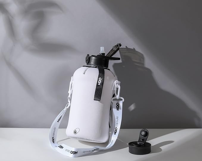 H2O Capsule 2.2L Half Gallon Water Bottle with Storage Sleeve and Covered Straw Lid – BPA Free Large Reusable Drink Container with Handle - Big Sports Jug, 2.2 Liter (74 Ounce)